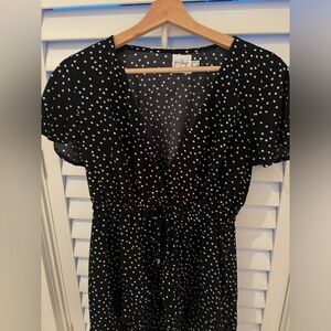 Black polka dot Princess Polly mini flowy dress.